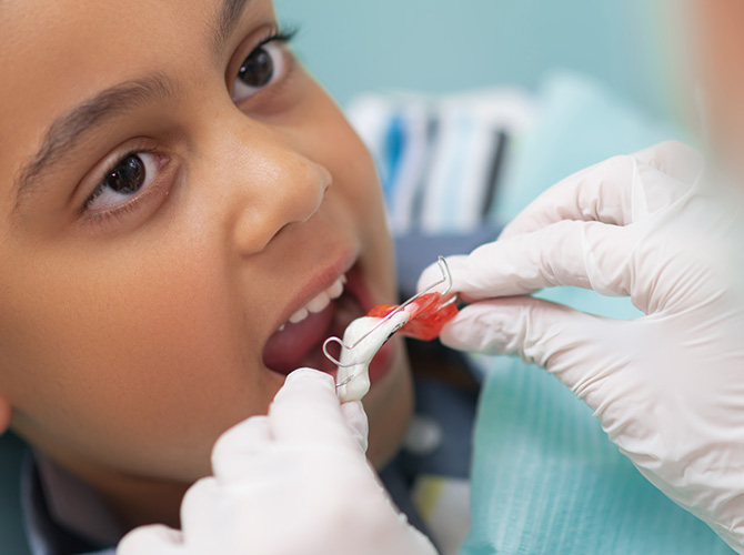 child with retainer