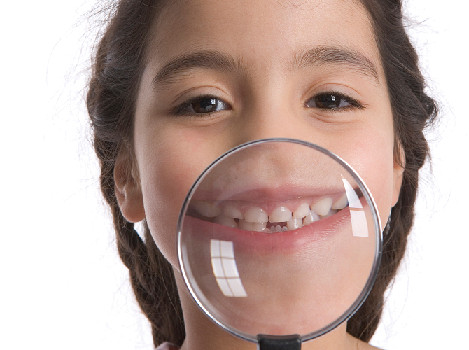 girl with a magnifying glass